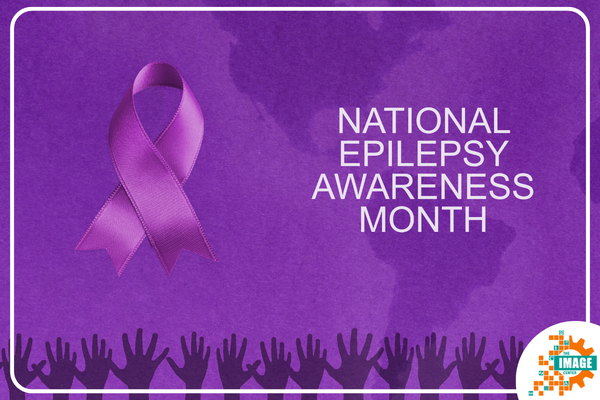 Purple graphic with purple ribbon and white text that says, National Epilepsy Awareness Month.